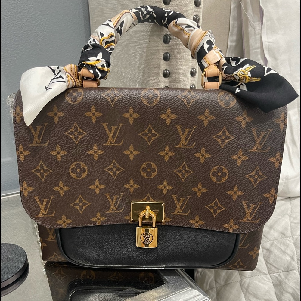 Louis Vuitton Shoulder Bag
With bandeau and extra strap Perfect condition